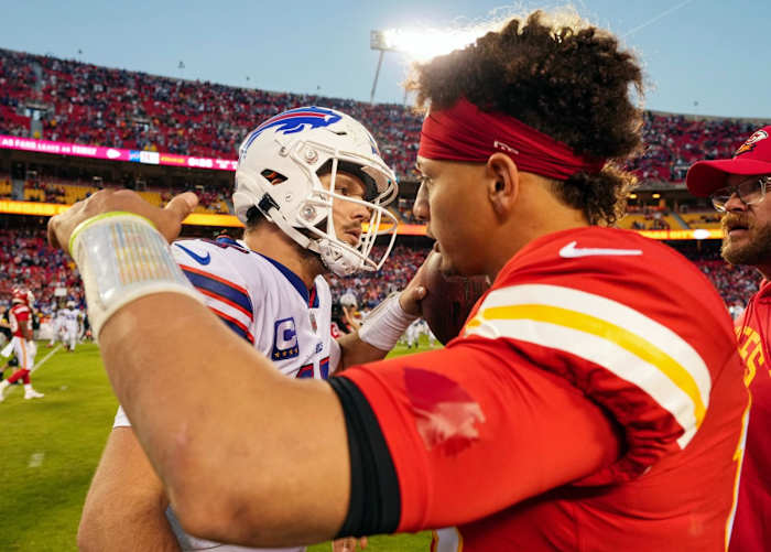 Buffalo Bills quarterback Josh Allen hugs Kansas City Chiefs quarterback Patrick Mahomes after a game
